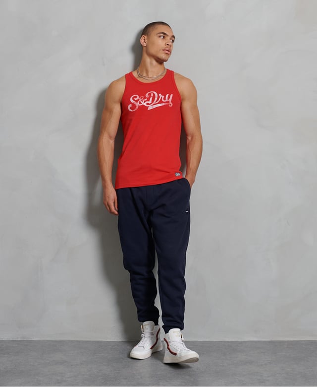 Perfect for relaxing in, or for wearing on the track, this vest is comfortable and stylish. Throw it on with joggers or shorts to complete the athleisure look.Slim fit – designed to fit closer to the body for a more tailored lookCrew necklineNo sleevesPrinted graphicCracked effect graphicNumeric back print