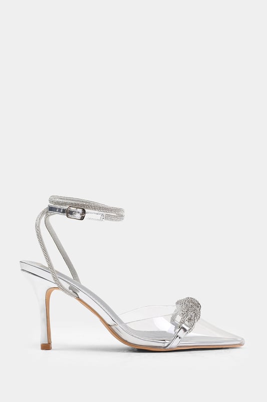 Step into the spotlight with our Monaco Perspex Heel with Embellished Detail and Diamante Cross Strap. These stunning heels are designed to make a statement and add a touch of glamour to any outfit.

Key Features:



Effortless Style: The combination of perspex material, pointed toe, and diamante detail create a unique and eye-catching look. These high heels effortlessly elevate your style, making you the centre of attention wherever you go.

Secure Fit: The diamante heels not only add a touch of sparkle but also ensure a secure fit that hugs your foot.

Durable Construction: Made with high-quality materials, our Perspex Pointed Toe Heels are built to last. The sturdy construction and reliable stitching ensure their durability, making them suitable for any occasion.


Specifications:


Heel height: 3.5' (9 cm) approx
Toe shape: Pointed

Invest in our Monaco Perspex Heel with Embellished Detail and Diamante Cross Strap heels for a perfect combination of style, comfort, and glamour. Make a statement and turn heads wherever you go. Get yours today and step into a world of elegance and sophistication!