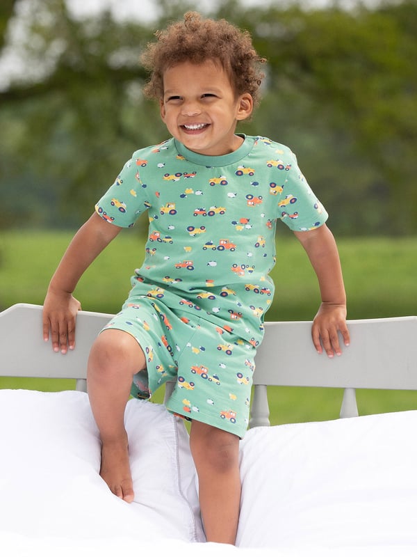 95% organic cotton 5% elastane | Proud to be certified to the Global Organic Textile Standard (GOTS) | Farmer Baa Baa all-over print | Sage green | Single jersey with a little bit of stretch (180-190 gsm) | Two-piece set | Short sleeved | Elasticated waistband with adjustable ties | Round neck with popper shoulder opening (up to and including size 3y) | Made in Turkey | Machine washable at 40 degrees, or at 30 degrees to be kinder to the planet