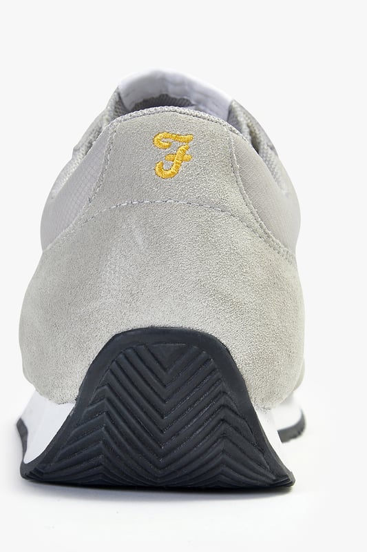 Farah Light Grey 'Leon' Casual Lace Up Trainers Level up your look this season with these runner style trainers from Farah. These shoes feature a canvas upper with faux suede panels, a Farah logo tongue detail, contrast rubber sole and an embroidered Farah logo on the side of the shoe. In a sleek, sporty silhouette, these trainers are the perfect addition to your new season wardrobe. Available in other colours.