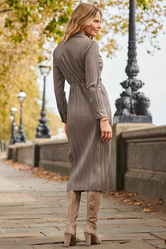 REASONS TO BUY:

A 'where did you get that dress?' dress
Crafted from the dreamiest plisse faux leather
Tie belt to cinch your waist
Shirt dresses are always in style
You'll wear it for work and play
We love it with suede knee-high boots