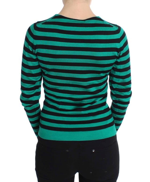 Märke: Dolce & Gabbana  
Skick: Ny med taggar  
Stil: Tröja med rund hals  
Färg: Svart och grön  
Tillverkad i Italien  
Material: 70% Kashmir 30% Silke  
Kön: Kvinnor  
Material: 70% Kashmir 30% Silke