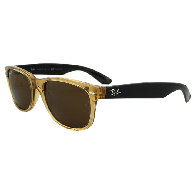 Ray-Ban Sunglasses New Wayfarer 2132 945/57 Honey Crystal Brown Polarized 55mm are an updated and slightly smaller interpretation of the Original Wayfarer. They feature a softer eye shape and sculpted temples that display the iconic Ray-Ban logo. The New Wayfarer 2132 are a versatile and playful choice that are available in countless colourways and the lightweight acetate frame is comfortable and easy to wear. The softer style of the 2132 suit more face shapes and is perfect for somebody that loves the Original Wayfarer design but is looking for a less dramatic look.