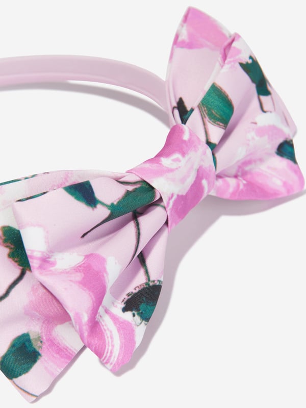 Mama Luma incorporate beautiful eco-friendly materials into their sophisticated handmade aesthetics. This girls pink headband is reflective of the Californian label's precision of beauty. Crafted in a top bow with floral patterning for a sweet finish. She will be obsessed. ‚ Handmade‚ Floral Patterning‚ Polyester‚ Bow‚ One Size