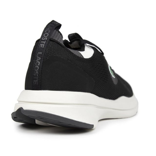 Lacoste Run Spin Trainers Women's Black Lacoste Run Spin Lace-up Trainers With Embroidered Logo Branding, Ghillie Eyelets And Breathable Nylon Uppers. These Ladies' Performance Sneakers Have Branded Taped Detailing On The Heel And Tongue, A Ortholite® Performance Insole, Textile Lining And Contrasting White Rubber Sole.