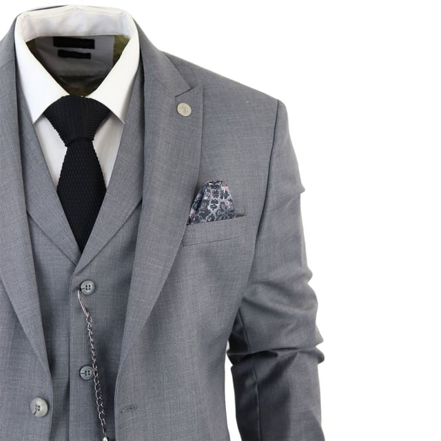 Step into sophistication with our Classic and Elegant Design men's 3-piece suit, featuring a timeless Grey color with contrasting pocket trims and a sophisticated textured pattern fabric, perfect for formal occasions. Product Design Bullet Points:  
Versatile Formal Attire: Suitable for weddings, business events, or special occasions, ensuring a sharp and well-dressed look. 
Complete 3-Piece Set: Includes a jacket, vest, trousers, and pocket chain for a polished and coordinated outfit. 
Premium Material: Crafted from high-quality materials for comfort and durability, ensuring long-lasting style. 
Sophisticated Textured Pattern Fabric: Adds a touch of elegance and refinement to your formal ensemble. 
Contrasting Pocket Trims: Enhances the visual appeal of the suit, adding depth and dimension to your look.  Made from a blend of 65% Polyester, 32% Viscose, and 3% Lycra for a comfortable and stylish finishSizes	Jacket & Trouser Size
36R :	36" (Chest) 30" (Waist)
38R :	38" (Chest) 32" (Waist)
40R :	40" (Chest) 34" (Waist)
42R : 	42" (Chest) 36" (Waist)
44R :	44" (Chest) 38" (Waist)
46R : 	46" (Chest) 40" (Waist)
48R :	48" (Chest) 42" (Waist)
50R :	50" (Chest) 44" (Waist)
52R :	52" (Chest) 46" (Waist)
54R :	54" (Chest) 48" (Waist)