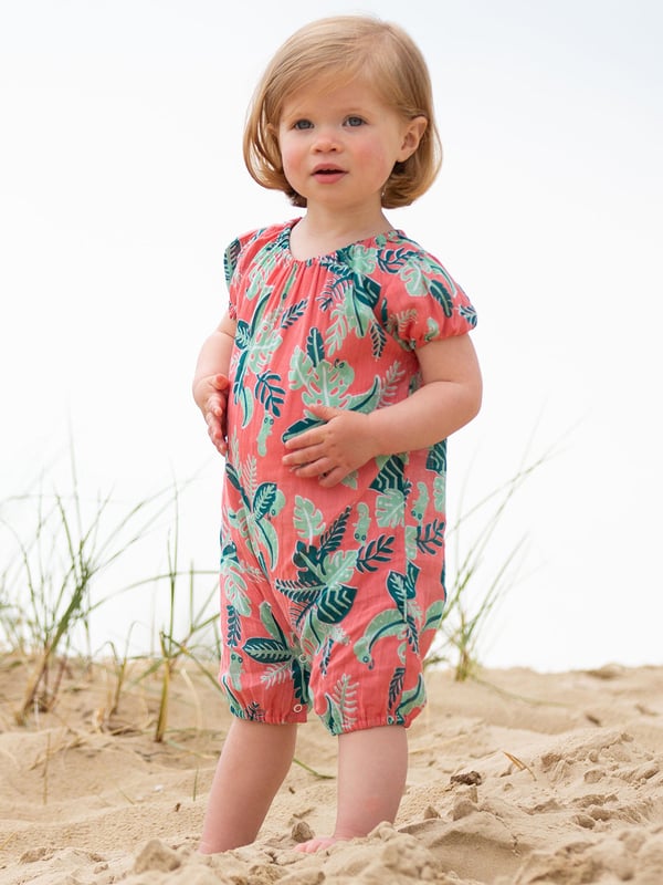 Perfect for beach days and holidays, this stylish and soft romper featuring our chameleon print on crinkle cotton is a must-have for your little one's summer wardrobe. There are a range of styles available in this print for all ages, so you can mix and match with friends, siblings and more!