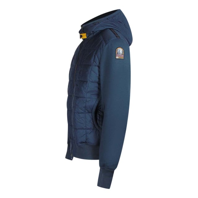 Chaqueta azul Parajumpers, dos bolsillos delanteros con cremallera, parche PJS en la manga izquierda, chaqueta 100% poliester, cintura y mangas elasticas