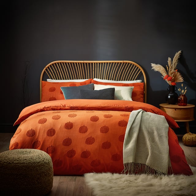 When the nights are drawing in and the weather is turning, why not add this warming duvet cover set, which is a pared back autumnal take on Halloween. Adorned with soft tufts of cotton in the shape of pumpkins and surrounded by a spiced orange 100% cotton fabric. This design adds a pop of colour to your bedroom, providing an elegant alternative to traditional Halloween décor.