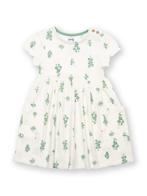 100% organic cotton | Proud to be certified to the Global Organic Textile Standard (GOTS) | Wildflower all-over print | Cream | Slub jersey (170-180 gsm) | Coconut button shoulder opening (up to and including size 3 years) | Side patch pockets | Short sleeved | Round neck | Made in Turkey | Machine washable at 40 degrees, or at 30 degrees to be kinder to the planet