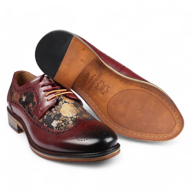 Add a unique touch to your formal wardrobe with the Ross Men's Floral Print Leather Brogue Shoes. Crafted from 100% premium leather, these brogues combine style, durability, and comfort. Featuring classic brogue detailing with decorative patterns, they bring elegance and sophistication to any look.

Unique Floral Print for a bold, stylish statement
Premium Leather for durability and luxury
Classic Brogue Detailing for timeless appeal
Lace-Up Design for an adjustable fit