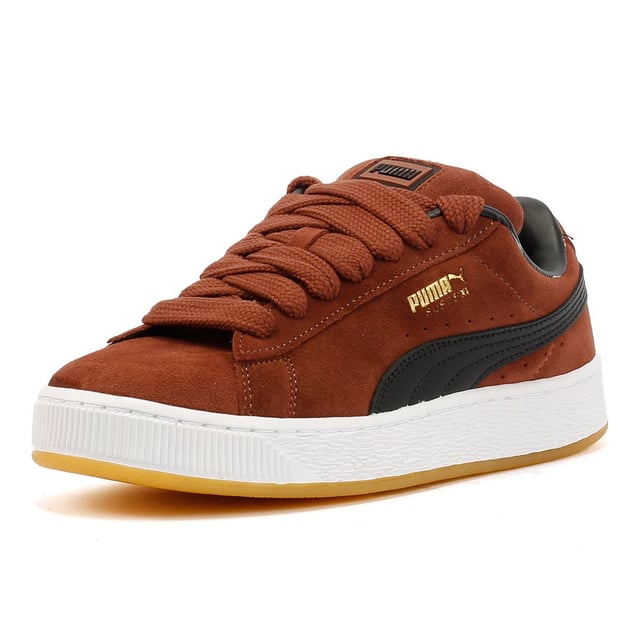 Sneakers featuring a premium suede upper for a sleek and stylish look. Debossed and foil-printed PUMA branding on the quarter panel adds a touch of sophistication. Finished with a durable rubber sole for reliable traction and comfort.