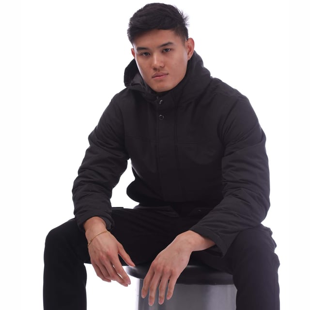 Mens Jack Jones Fen Parka Jacket in black.- Fixed hood.- Funnel neck.- Full zip fastening with storm placket.- Long sleeves.- Side entry flap pockets with snap closure.- Inner pocket at left chest.- Fully lined.- Main material: 100% Polyester.  Lining: 100% Recycled polyester.  Padding: 100% Recycled polyester fibres.  Machine washable.- Ref: 12268018