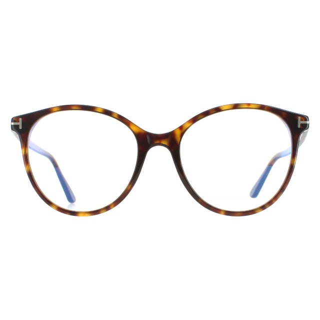 Tom Ford Round Womens Dark Havana FT5742-B  FT5742-B are a modern round style crafted from lightweight acetate. Signature Tom Ford Ts wrap around the corner flick and along the slender temples. These ready to wear glasses have blue light block lenses that help to prevent and reduce eye strain against long exposure to digital devices.