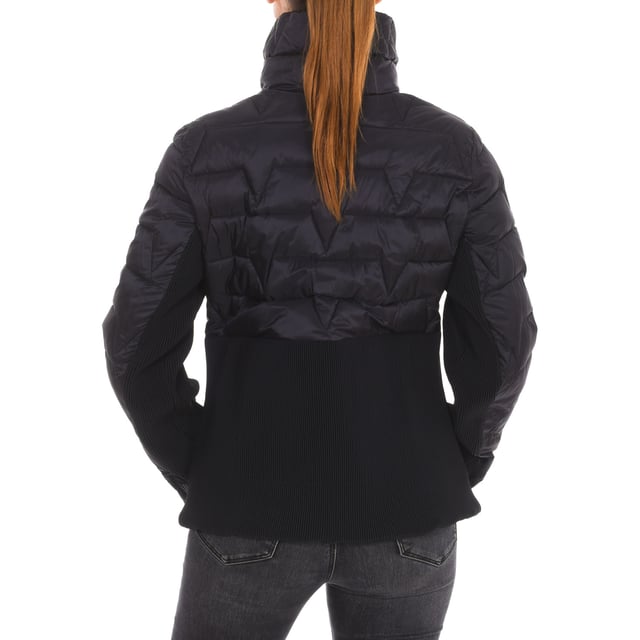 Padded jacket Vuarnet.
 Long neck
 Zip closure.
 Zipper cuffs.
 Ribbed waist.
 One zipper pocket inside.
 Brand insignia on one sleeve.
 Seams seen in tone.
 Composition: 100% Polyamide
 Care:
Wash at maximum temperature 30º.
 Iron at low temperature.
 Low temperature drying.
 Do not use bleach.
 Do not dry clean.