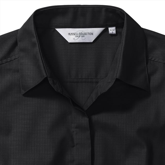 One of the great classic shirt fabrics, combining elegance with durability and wearer comfort. Smart and stylish fitted shirt design in a fine poplin fabric. Concealed placket. Stylish yoke design. Darts on bust front hem and back panel for fitted shape. Decorative top stitch on darts. Modern rounded 2 button cuffs. Rounded hem. The elegant lightweight fabric is especially suited for finer embroideries. Also available in mens sizes, code 924M. Weight: 110- 115g/m². Fabric: 65% Polyester, 35% Cotton. XS (30-32: To Fit (ins), 8: Dress Size). S (32-34: To Fit (ins), 10: Dress Size). M (34-36: To Fit (ins), 12: Dress Size). L (36-38: To Fit (ins), 14: Dress Size). XL (38-41: To Fit (ins), 16: Dress Size). 2XL (41-44: To Fit (ins), 18: Dress Size). 3XL (44-47: To Fit (ins), 20: Dress Size). 4XL (47-51: To Fit (ins), 22: Dress Size). RUSSELL COLLECTION - a variety of Mens and Womens corporatewear in a wide range of styles, colours and sizes.