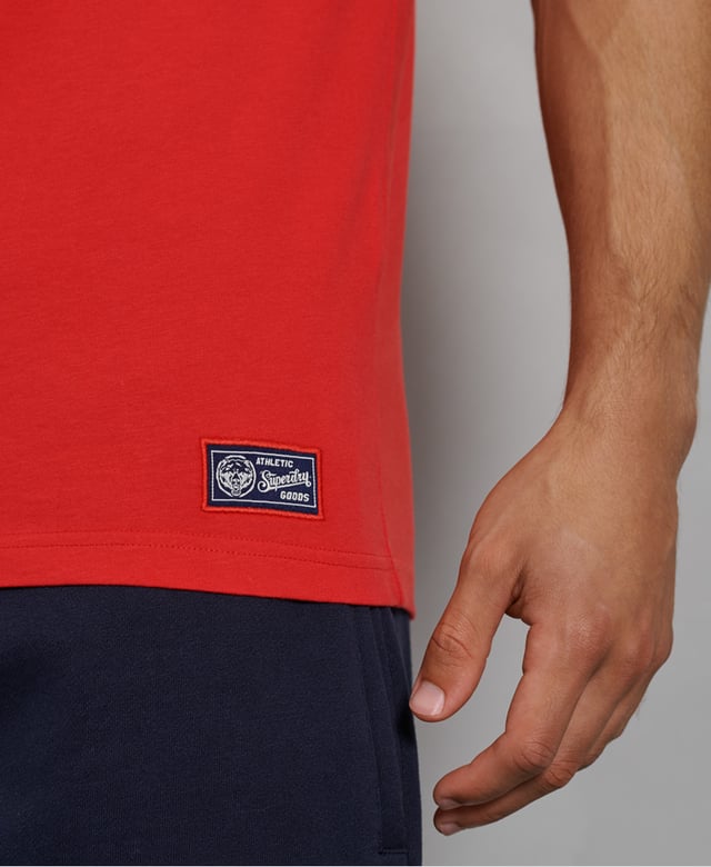 Perfect for relaxing in, or for wearing on the track, this vest is comfortable and stylish. Throw it on with joggers or shorts to complete the athleisure look.Slim fit – designed to fit closer to the body for a more tailored lookCrew necklineNo sleevesPrinted graphicCracked effect graphicNumeric back print
