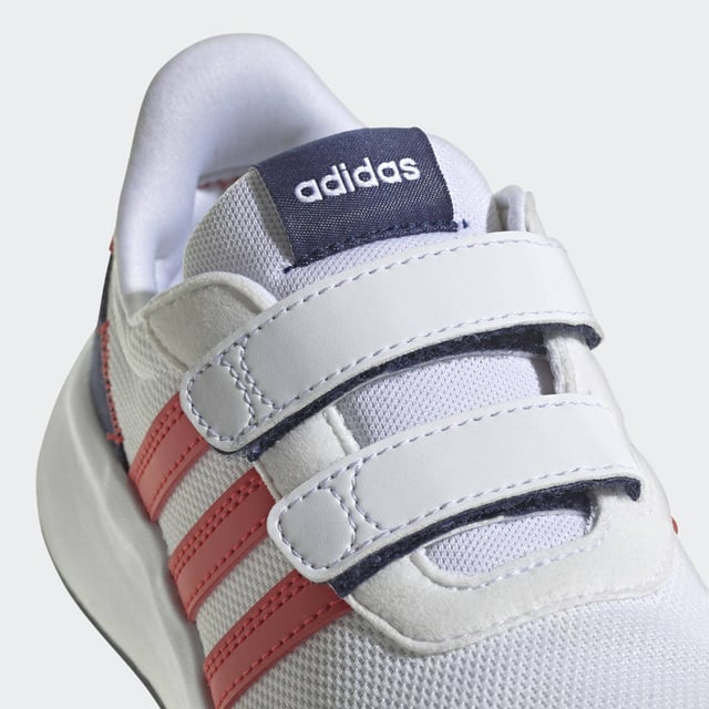 Bring your child a touch of the old school. These kids' adidas sneakers are inspired by '70s running shoes and have two hook-and-loop straps to ensure those feet stay in place. The Cloudfoam midsole is soft and cushiony to keep them comfortable throughout the day. Suede overlays on the toe and heel add a touch of nostalgia and texture to the look. Made with a series of recycled materials, and at least 50% recycled content, this product represents just one of adidas' solutions to help end plastic waste.  - Regular fit - Hook-and-loop closure - Closed mesh upper - Textile lining - Toe and heel protective overlays - Cloudfoam midsole - Rubber outsole - Upper contains a minimum of 50% recycled content  Shipped by adidas