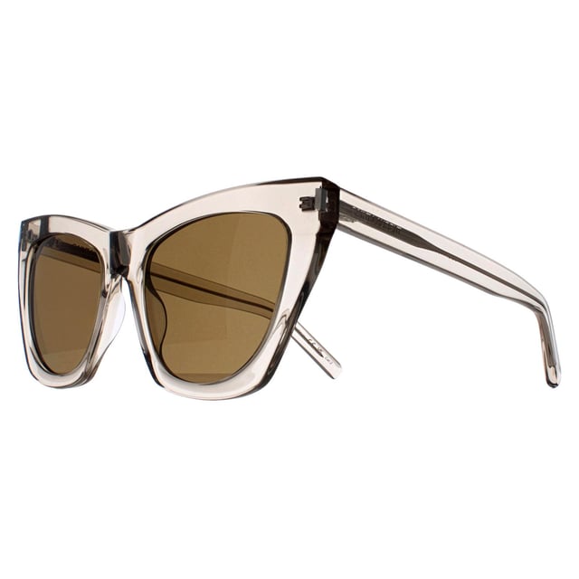 Saint Laurent Cat Eye Womens Transparent Beige Brown SL214 Kate  Sunglasses are a harmonious blend of timeless elegance and Parisian chic. These sunglasses encapsulate the iconic allure of the fashion house with their sleek acetate frame, featuring a slender cat eye silhouette that exudes vintage-inspired charm. Adorned with slim temples and the iconic Saint Laurent logo at the hinges, these sunglasses radiate refined opulence.