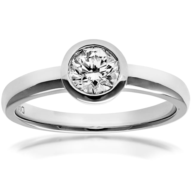 18K (750) witgoud: 3,4 gram; # Diamant: 0,5 ct