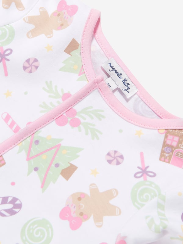 Introducing Magnolia Baby's exclusive Baby Girls Sweet Gingerbread Babygrow in Pink, a sublime addition to your Baby_Girls' wardrobe. Rendered in an elegant White hue, this piece exudes charm and style. Key features:  Whimsical Design: Featuring a delightful gingerbread print, this top adds a fun, chic vibe to your little one's outfit.  Comfy &amp; Cosy: Made from luxe materials, ensuring optimum comfort for your child's day-to-day escapades. Upgrade your Baby_Girls' attire with this elegant Babygrow from Magnolia Baby. Act fast, let your baby girl dazzle in this superior piece!