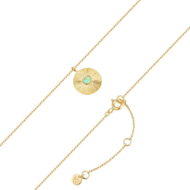 Eye-catching necklaces are in trend - like this model from the Glanzstücken München label in boho style. The eye-catcher is the antique structured surface of the amulet-shaped pendant with a sun motif, decorated with a heart-shaped turquoise inlay (rec.) Did you know that the healing stone was revered as a good luck charm in many cultures in ancient times? Even today, turquoise is still popular as a protective stone and talisman in jewelry form. The pendant dangles from a delicate anchor chain, both made from 925 sterling silver and finished with warm, shiny yellow gold. Thanks to the extension piece with spring ring clasp, the length of the chain can be easily adjusted. An accessory that not only casually enhances festival outfits!