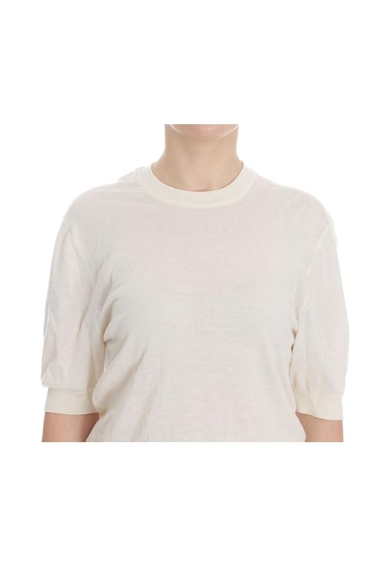 Brand: Dolce \\u0026 Gabbana.\\n  Condition: Brand new with tags.\\n  Material: 100% cashmere.\\n  Color: White.\\n  Sleeve: 1/2 sleeve.\\n  Made in Italy.\\n  Logo details.