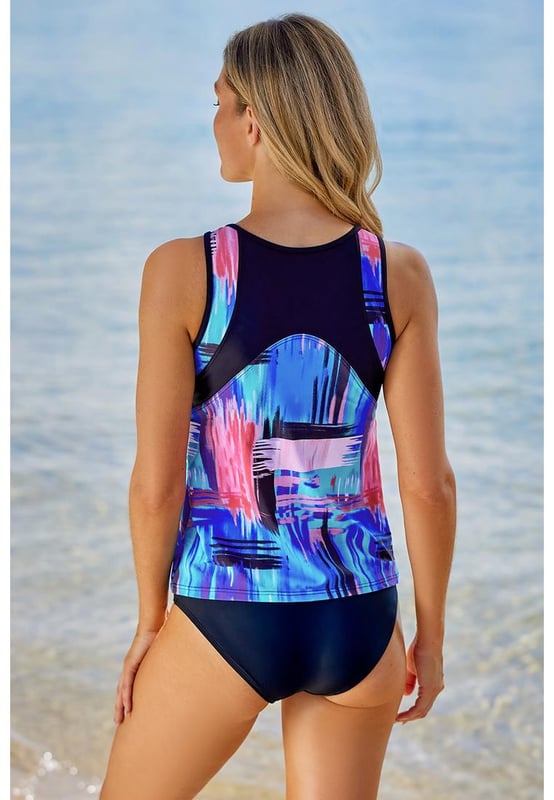 Stijlvolle en comfortabele mouwloze tankini badpak  
Ontworpen voor vrouwen  
Gemaakt van kwaliteitsmaterialen  
Flatterende pasvorm en uitstekende ondersteuning  
Mouwloos ontwerp zorgt voor bewegingsgemak  
Perfect voor het strand of de spa
