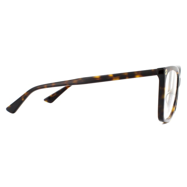 Gucci Glasses Frames GG0025O 002 Dark Havana Women are a gorgeous cat eye style crafted from lightweight acetate and features the interlocking Gucci GG logo on the frame corners, and the bee logo on one temple tip.