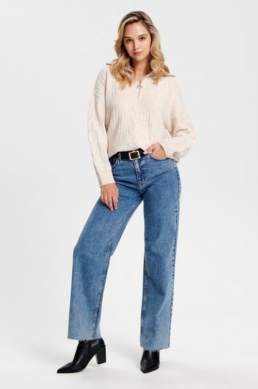 Gorgeous winter jumper in two luxurious soft colours. Great for casual looks, or paired with knee high boots for a contemporary stylish look. Super soft cable knit, in an oversize relaxed fit. Model wears a UK XS (is usually a size 8-10). Size down for a more fitted look.

Super soft chunky cable knit
72% Acrylic 25% Polyester 3% Elastane
Zip Neck with collar
26" Shoulder to Hem
Long Sleeve
Sizing: Run large for size
Fit: Oversized Boyfriend Fit