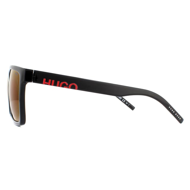 Hugo by Hugo Boss Sunglasses 1069/S 807 AO Black Red are a large square design made from lightweight acetate. The flat frame top creates a contemporary feel and the temples feature the Hugo logo..