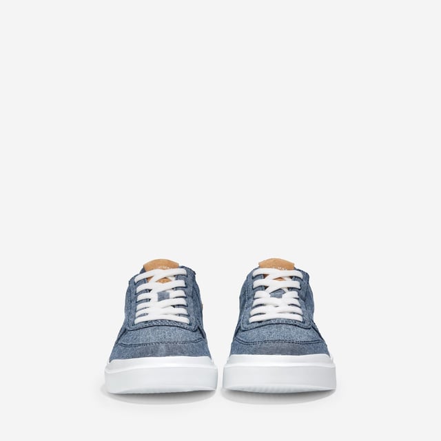 We've given our much-loved, signature GrandPro Rally Court Sneaker an update in organic canvas. Crafted from high-end-yet-durable materials, it features a luxuriously cushioned GRANDFOAM footbed, an EVA outsole, and a classic old-school sneaker vibe