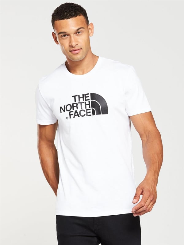 The North Face Mens Short Sleeve Easy Tee.     
Pressed Plastisol Print at Front.     
The North Face Logo on the Back of the Shoulder.     
Classic Length Short-sleeve T-shirt With Crew Neck.      
100% Cotton.     
Machine Washable (Please See Care Label).     
The North Face Mens T Shirt TNF Short Sleeve Crew Neck Cotton Casual Easy Tee.