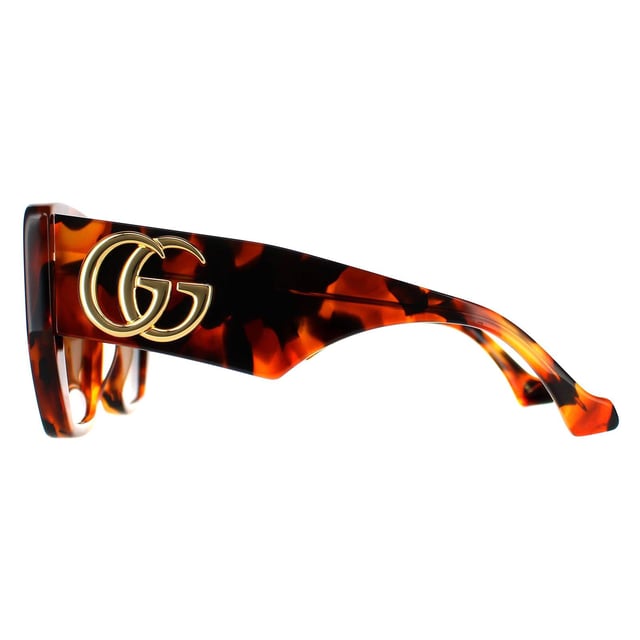 Gucci Square Womens Havana Brown GG0956S  Sunglasses have a super chunky acetate frame with wide temples and an extra large interlocking metal GG logo.