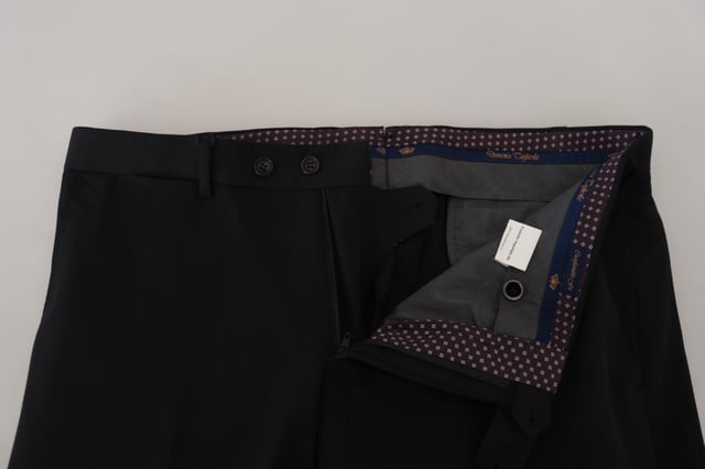 Brand: Domenico Tagliente\n
  Model: Dress pants\n
  Color: Black\n
  Material: 94% Polyester 6% Elastane\n
  Made in Italy\n
  Logo details
Material: 94% Polyester 6% Elastane