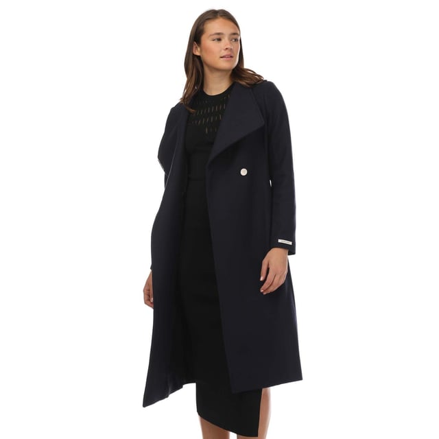 Womens Ted Baker Rose Wool Wrap Coat in Navy- In any weather  the ROSE coat will level up your wardrobe. Made from wool  it's cut in Ted Baker's signature wrap style  and completed with elevated details such as the high neck collar and metallic tipping on the belt.- Wool coat- Wrap front- Magnetic collar- Long sleeves- Midi length- Belted- Button fastening- Shell: 77% Wool  18% Polyamide  5% Cashmere.  Body Lining: 50% Viscose  50% Acetate.  Sleeve lining: 100% Polyester.  Do not wash; may be dry cleaned.- Ref: 249306NAVY