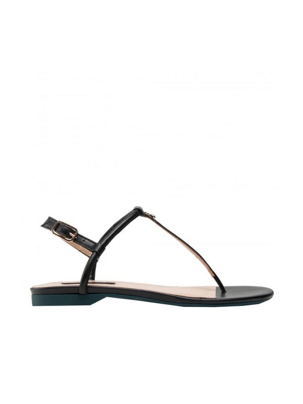 Type slippers
Fastened with a strap around the ankle
With a brand pendant on the strap
With a branded sole
Made of high-quality genuine leather
Leather insole and lining
Packaged in a branded box
Produced in Italy