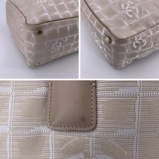 VINTAGE, RRP AS NEW
Chanel beige jacquard nylon tote bag from the 'Travel line' collection. Period/Era: 2003/2004. Beige leather top handles. Nylon lining with 2 side zip pockets inside. 'Chanel - Made in Italy' tag , ity hologram tag inside the bag Condition Rating: B - VERY GOOD CONDITIONCondition Details: Some war of use on bottom corners. Some darkness on leather handles. Some brown stains on the internal lining. Please, look carefully at the photos and ask if you have any doubts.Measurements (cm):Depth: 15.2Height: 25.4Length: 35.6Other Details: Dustbag? NoKeys? NoBox? NoMeasurments:  width: 152 mm length: 356 mm height: 254 mm