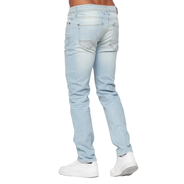 98% Cotton, 2% Elastane. Fabric: Twill. Design: Plain. Pockets: 2 Side Pockets, 2 Back Pockets, 1 Coin Pocket. Fastening: Button, Zip Fly. Fit: Slim. Branded Buttons.