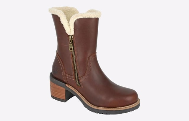 The Woodland Banyan Women's Fur-Lined Ankle Boots are the perfect combination of fashion, warmth, and functionality, making them an excellent choice for women who need reliable footwear for cold weather while maintaining a stylish look.- Leather upper- Zip closure- Fur lined- Cushioned footbed- Raised heel- Durable rubber outsole- Woodland branding
