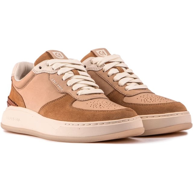 What A Fab Sneaker - The Court-style Crossover Trainer From Cole Haan Has A Superior Leather Upper Combined With The Distinctive, Sporty Grand 360 Sole. The Blind Eye Lacing System And Lightweight Fit Ensure A Steady Step, While The Retro-inspired Design And Cushioned Eva Footbed Allow For Greater Flexibility, A Softer Ride And Stylish Looks. All-day Comfort Has Never Looked Better.
