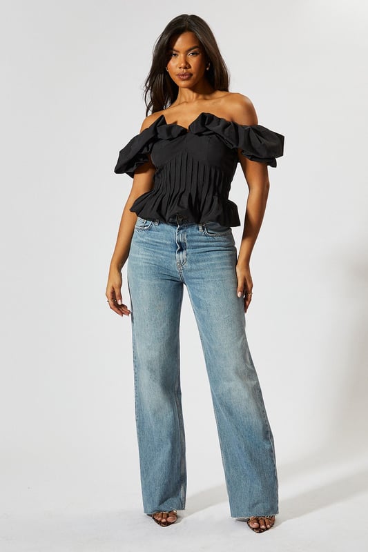 Striking bardot neckline with ruffle detail
        Cinched waist for a flattering silhouette
        Off-shoulder design with short sleeves
        Textured fabric with vertical pleating
        Cropped length perfect for high-waisted bottoms
    
    Make a statement with this eye-catching Ruffle Bardot Cinched Waist Top from MissPap. The off-shoulder design with its dramatic ruffle detail creates a captivating look that's sure to turn heads. The cinched waist accentuates your figure, while the vertical pleating adds texture and interest. Perfect for those who love to be the centre of attention, this top pairs beautifully with high-waisted jeans for a casual yet stylish ensemble. Dress it up with a sleek skirt and heels for a night out, or keep it relaxed with wide-leg trousers and trainers for a chic daytime look. Whether you're heading to a family gathering or meeting friends for drinks, this versatile piece allows you to customise your style to suit any casual occasion. The cropped length is ideal for showing off your favourite bottoms, making it a must-have addition to your wardrobe.