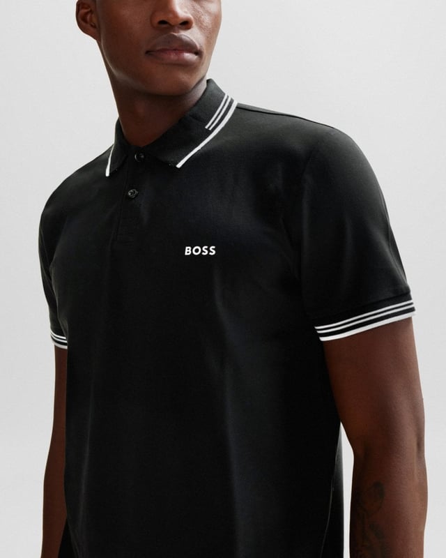 A contemporary polo shirt cut to a defined fit by BOSS Menswear, created in stretch cotton with contrast stripes and branding.

Slim fit
Flat-knit collar
Number of buttons: 2
Short sleeves
Flat-knit cuffs
Standard length
92% Cotton, 8% Elastane

50506193