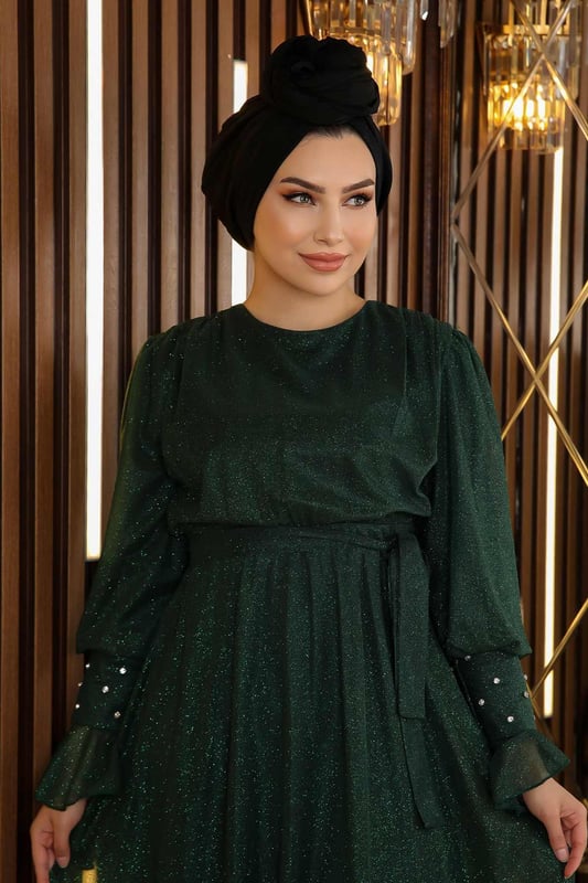 Stoffmerkmal: Hergestellt aus glitzerndem Chiffon-Stoff. Produktmerkmal: Neues Hijab-Modestück der Saison. Gefüttert. Mit Knopfverschluss am Rücken. Elastischer Bund. Manschetten mit Steinverzierungen. Wird mit einem abnehmbaren Gürtel geliefert. Aufgrund von Konzeptfotoshootings kann es zu leichten Farbabweichungen beim Produkt kommen. Das Model trägt Größe 38. Größe 38 Abendkleid