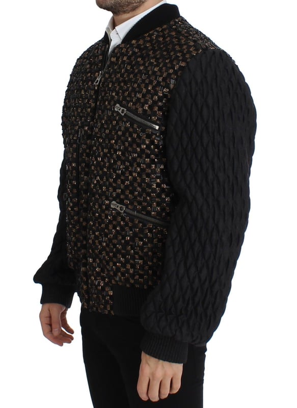 100% authentic Dolce & Gabbana black sequined jacket with gold detailing
  Straight from the Runway/catwalk
  Full zipper closure
  Four front pockets with zipper closure
  Two inside pockets
  Gold and black colored sequined detailing
  Quilted stitched arms
  Warm inner lining
  Logo details and logo engraved metal detailing
  Made in Italy
  Material: 35% Goatskin Leather 30% Lana wool 20% Glass 10% Plastic 5% Wool
  Lining: 42% Rayon 42% Acetate 16% Goatskin
Material: 35% Goatskin Leather 30% Lana wool 20% Glass 10% Plastic 5% Wool