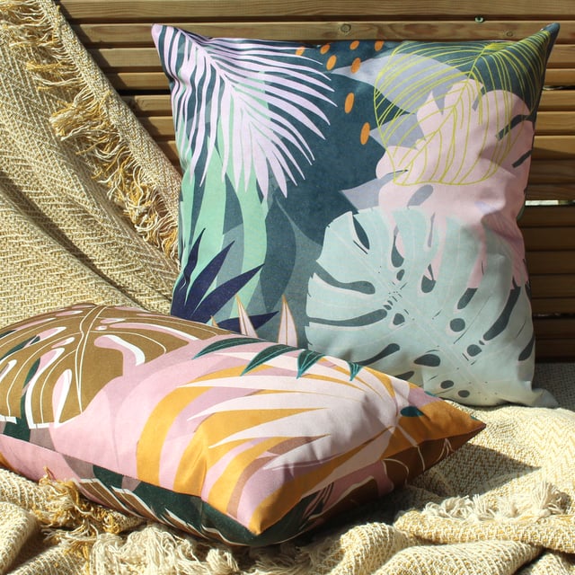 Featuring a bold and abstract design of palm leaves. There is a fully reversible design in pastel pinks and bright green's will instantly freshen up your outdoor space.
