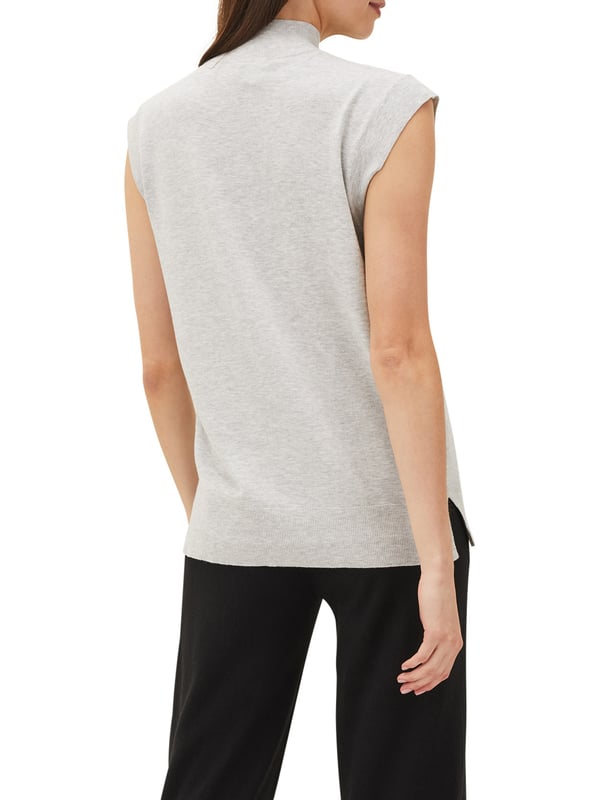 A chic and contemporary separate our fine knit Kitta tank top offers a relaxed take on minimalist elegance. We're styling ours with black jersey culottes and white trainers for an effortless off-duty look.