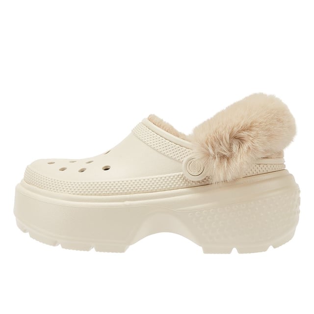 Experience unmatched comfort with these clogs, boasting excessively chunky soles that give you a 5.5cm / 2.1-inch heel height for added style. Their lightweight construction ensures all-day wearability, and the fully lined interior keeps your feet cosy. Plus, the fuzz-wrapped pivotable backstrap enhances both the look and feel of these exceptional clogs. Jibbitz™ holes makes it easy to personalise.