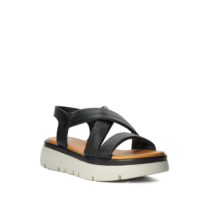 Dune Ladies Lounge - Chunky Leather Sandals Slide into our effortlessly stylish Lounge sandals. The leather straps cross over the front of the foot, and we love the directional look of the trend-led tractor sole. Complete with a square toe the contrasting leather sole is ultra-smooth and features our bespoke Dune London logo, making this style a covetable choice for any woman's summer sandal collection.