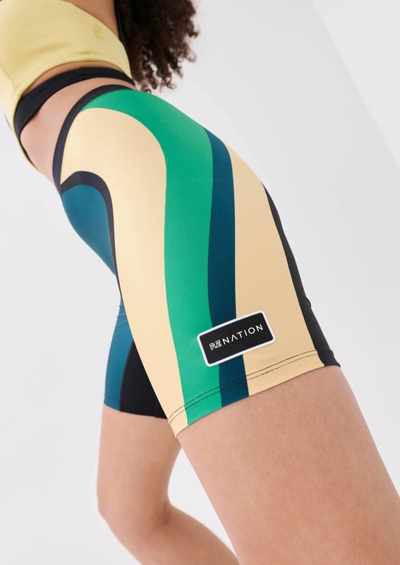 Active 5 bike shorts. Supreme stretch & recovery, lightweight fabric. P.E Nation woven jacquard waistband. P.E Nation logo at hem